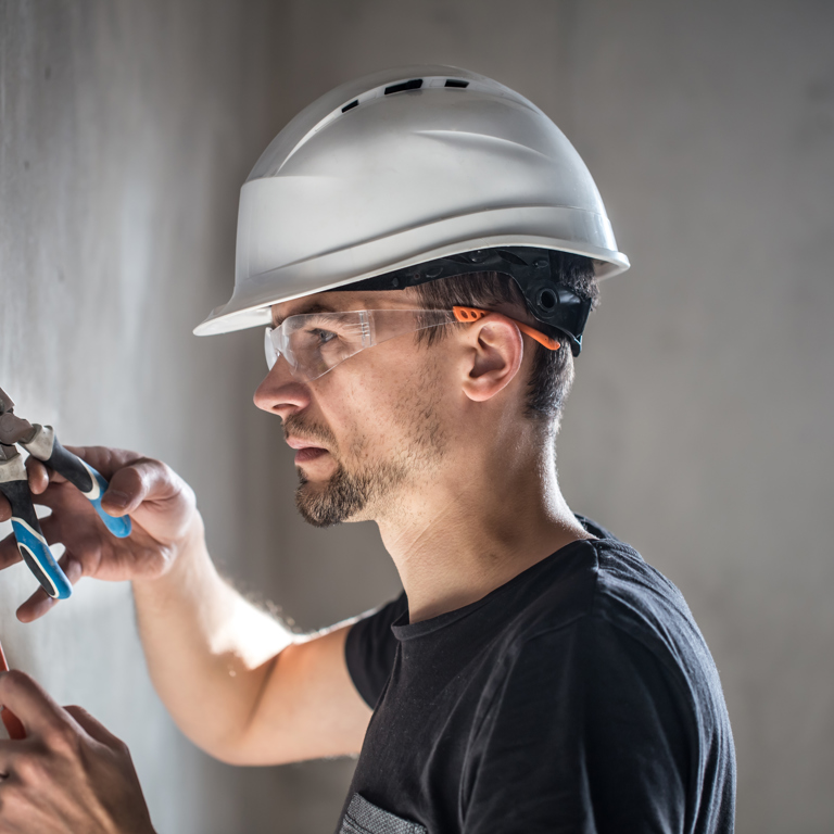 28 Man Electrical Technician Working Switchboard With Fuses Installation Connection Electrical Equipment